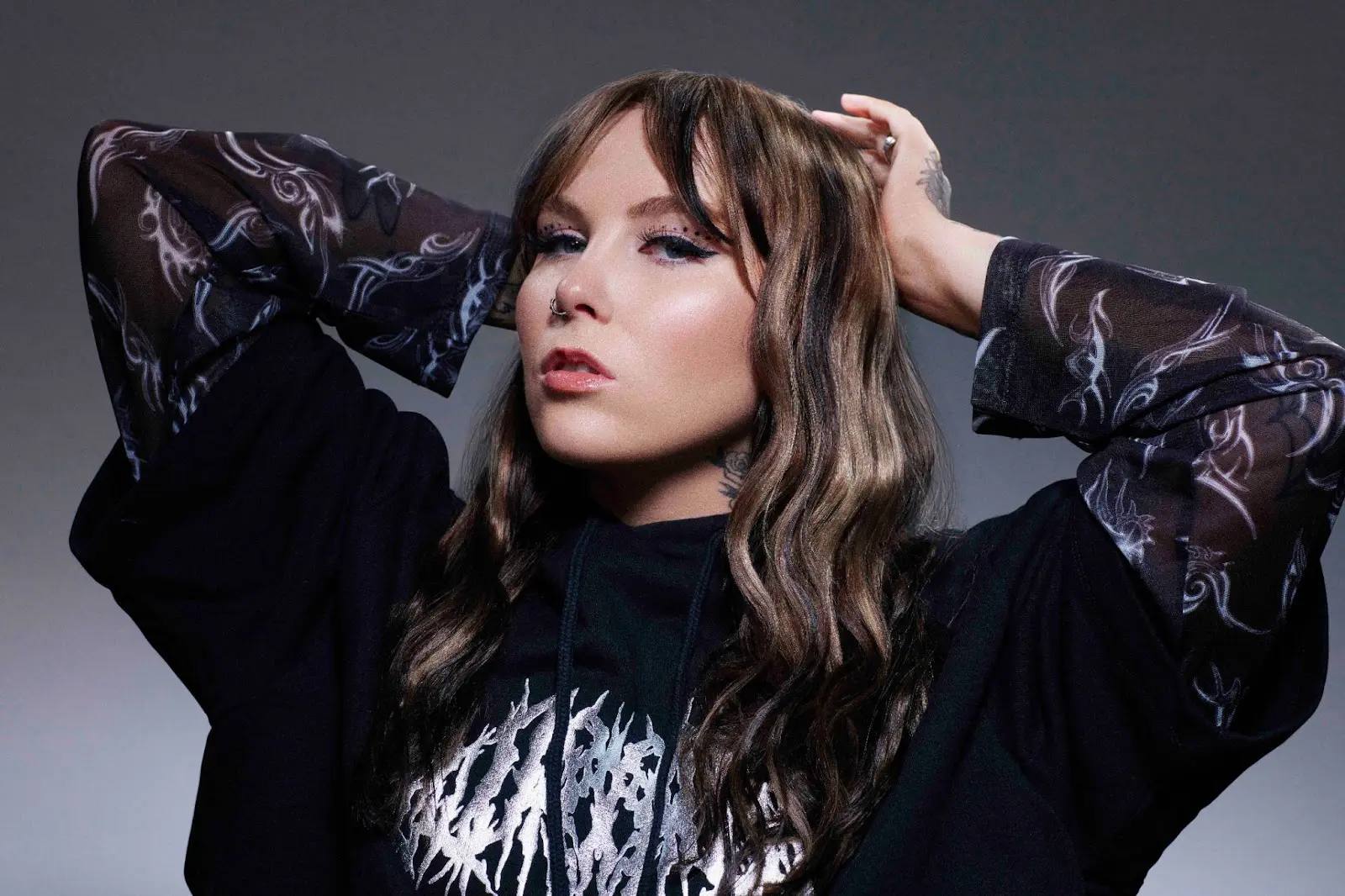 Kenya Grace wearing black top