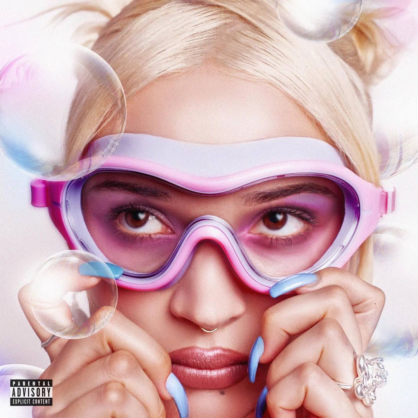Lolo Zouai wearing pink goggles on the cover of "Crying in The Car Wash"