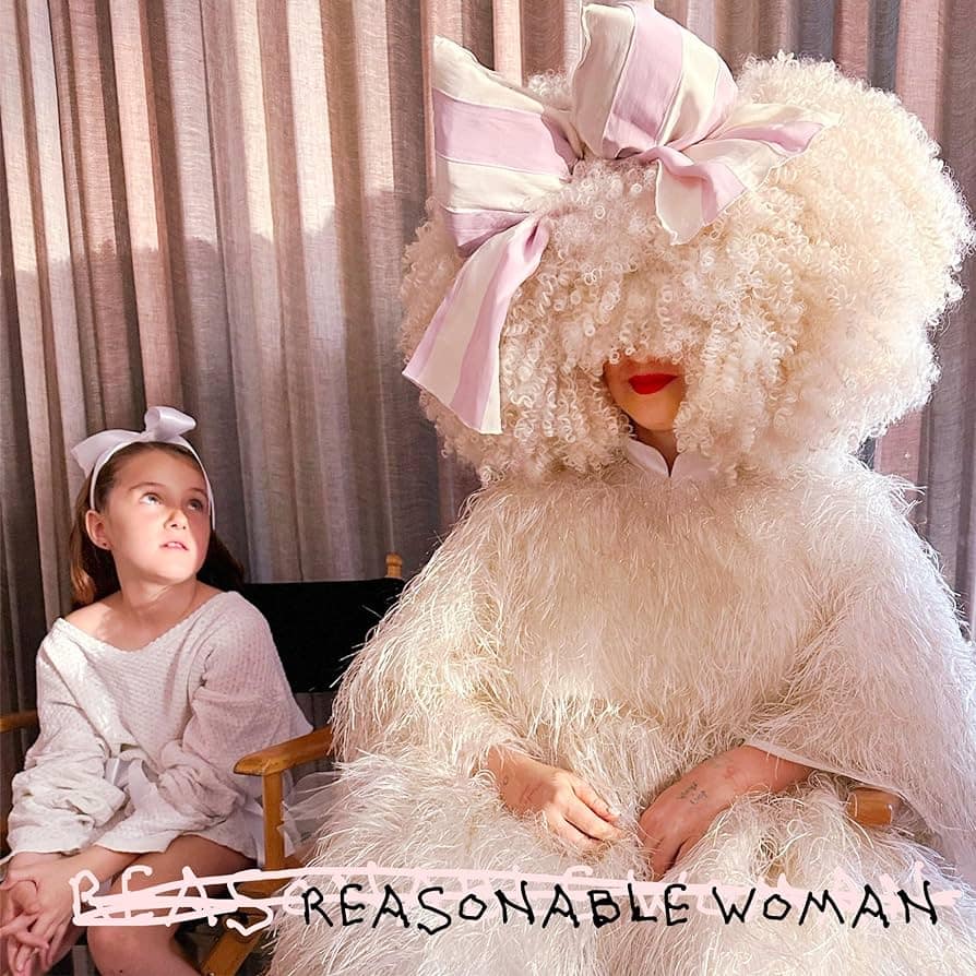 Sia, joined by a young child sporting her signature oversized wig with a giant pink bow, graces the cover of the 'Reasonable Woman' album