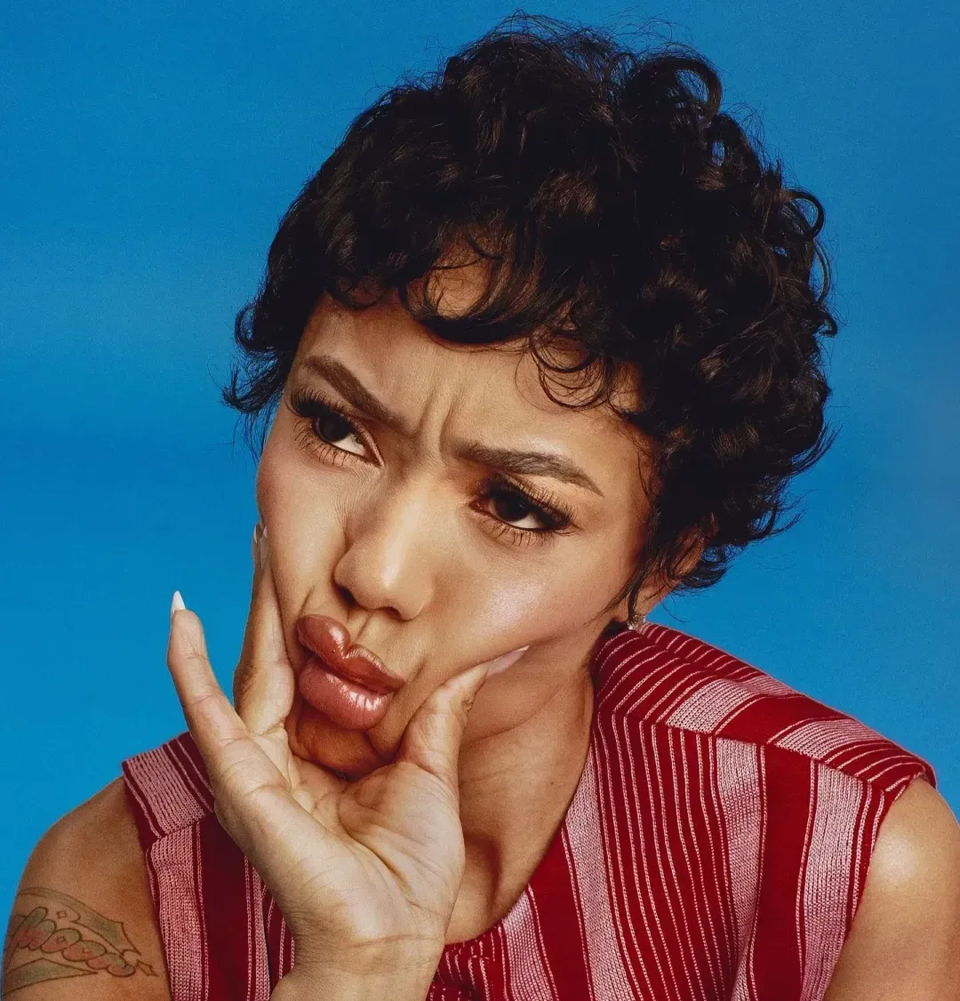 Coi Leray with curly short hair for Wonderland Magazine, artist profile, bio
