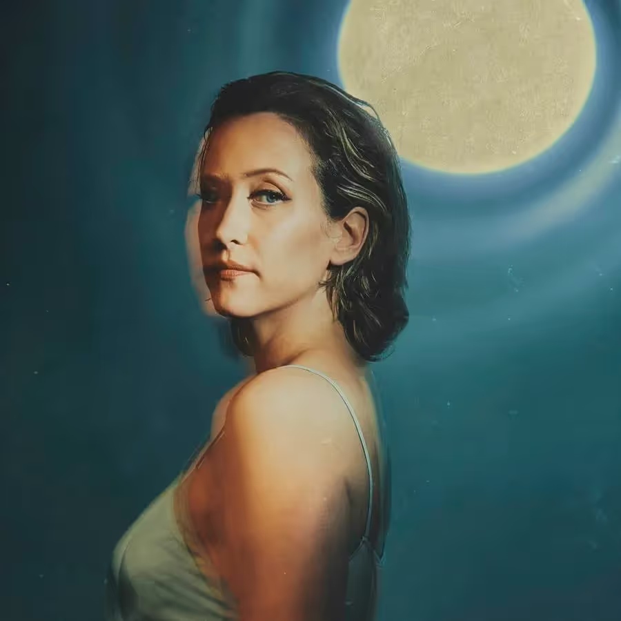 Few Bits - portrait against night sky and moon