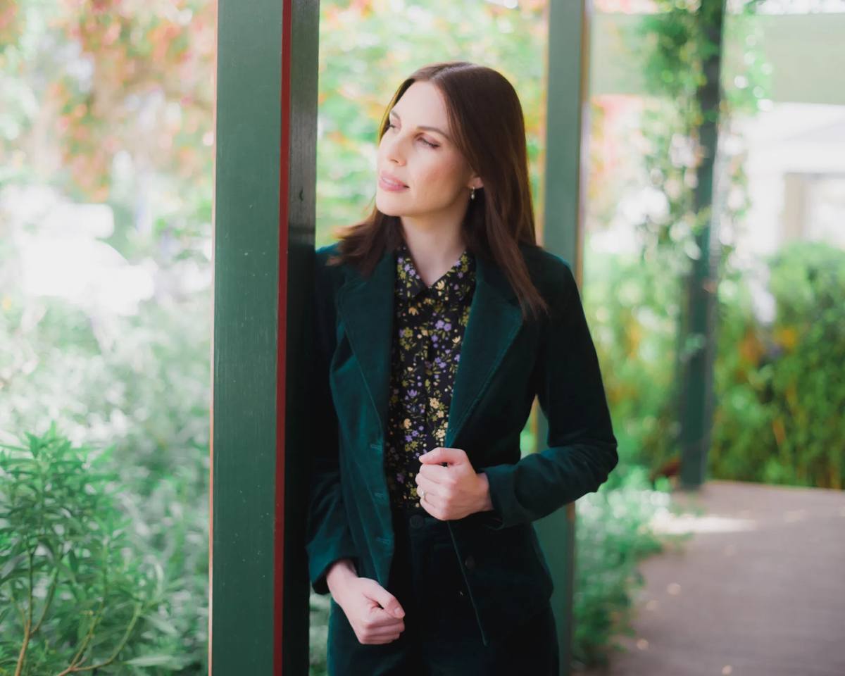 Helen Shanahan, green velvet suit, flowery black shirt